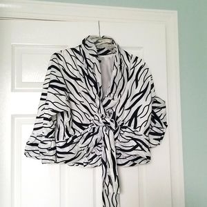 Black and white jacket with front tie closure